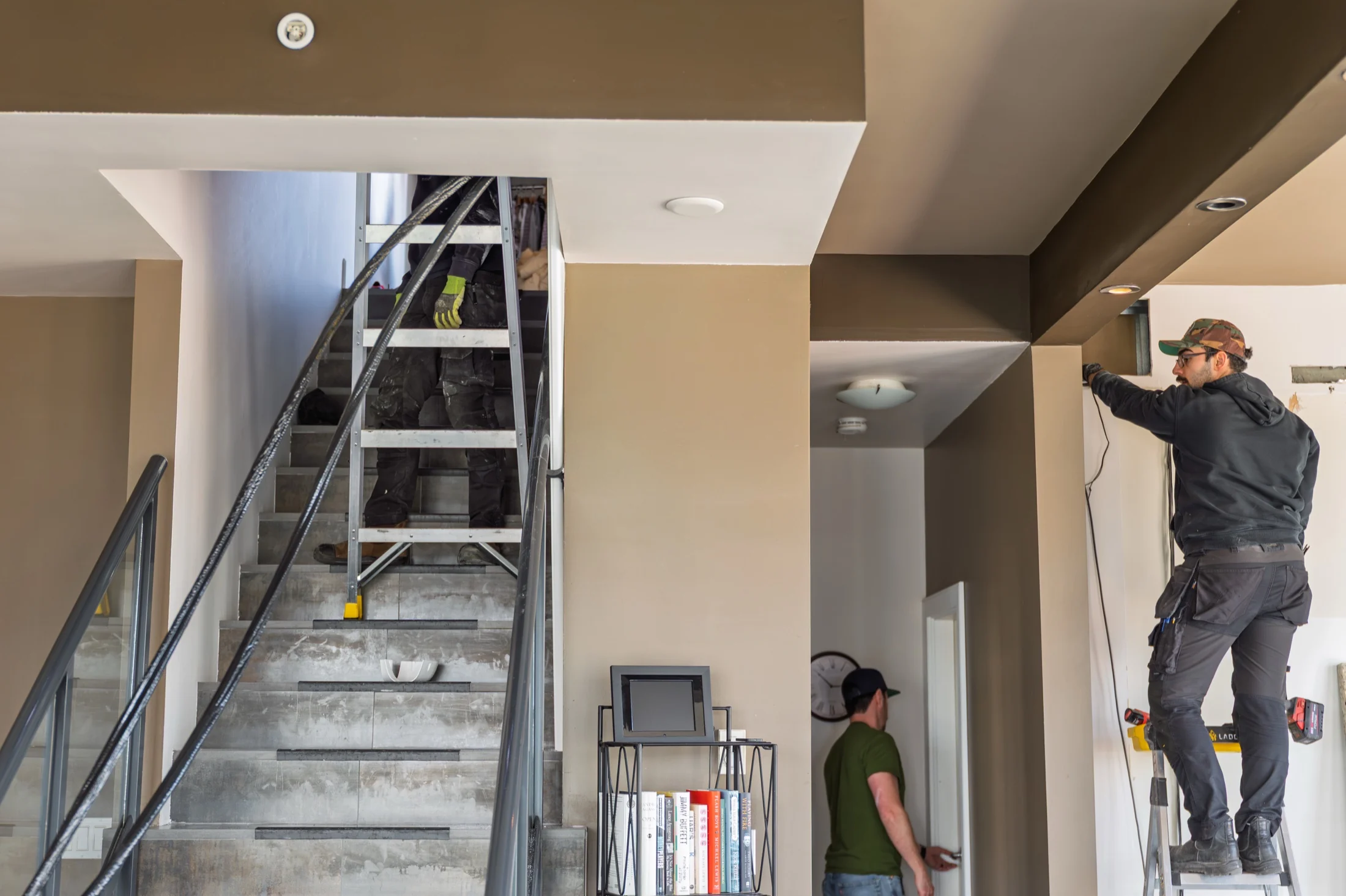Titanium technician working inside a home